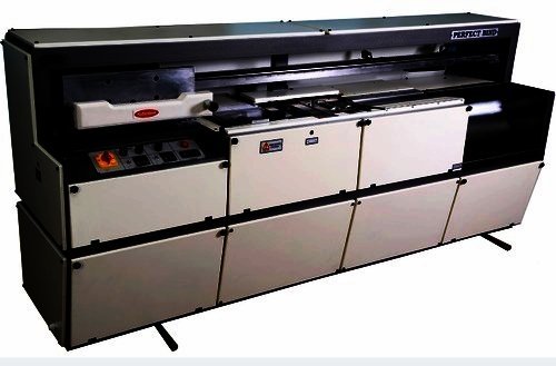Large black perfect binding machine with several units