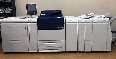 Digital press with paper trays and finisher
