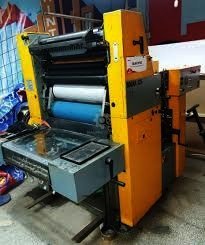 Small-format offset press with orange frame