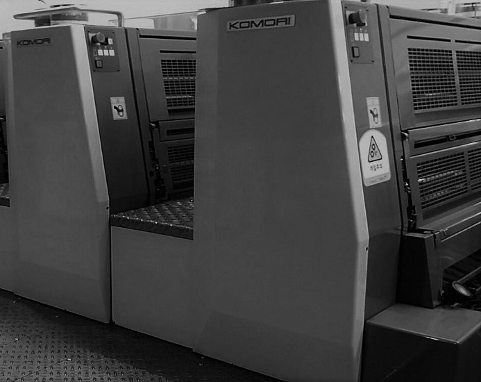 Close-up of a two-colour offset press