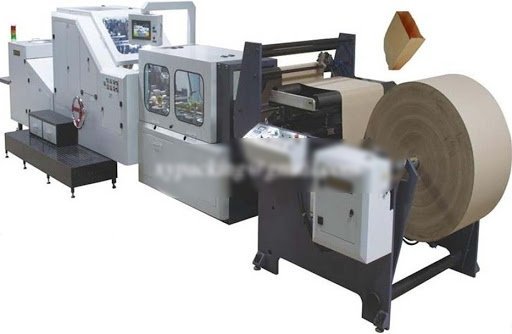 Paper bag making machine with large kraft paper roll