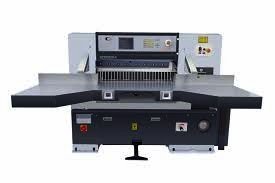 Hydraulic guillotine paper cutter with side tables